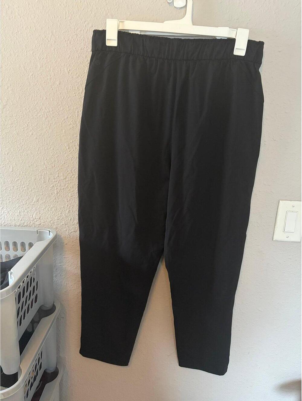 Lululemon Keep Moving Pant 7/8 High-Rise 27in inseam Black size 14. EUC. $118 re